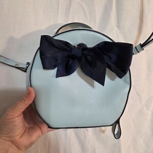 London Fog Light Blue Round Crossbody Bag with Navy Bow NWOT
